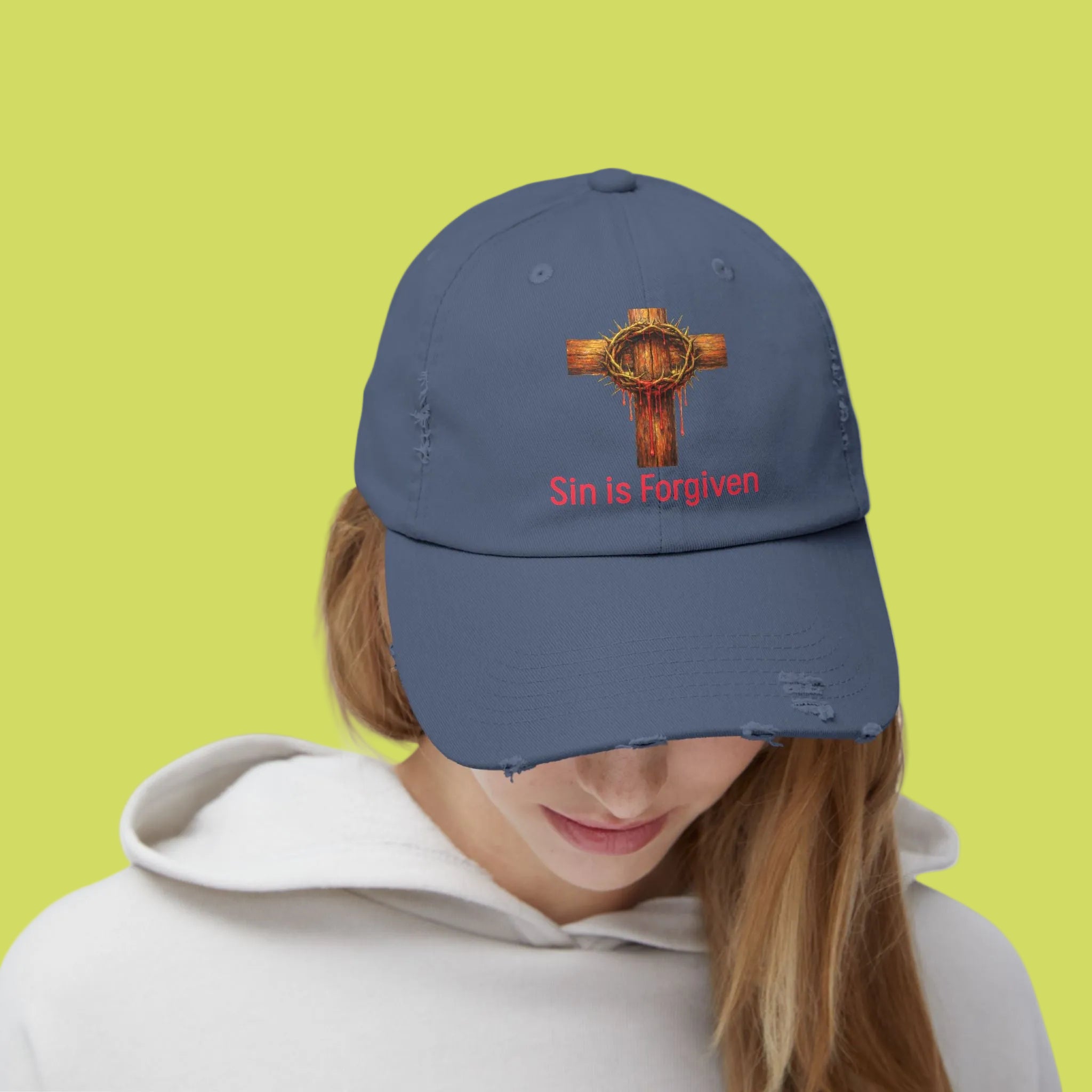 Forgiven Cross Distressed Cap — "Sin is Forgiven" Christian Baseball Hat